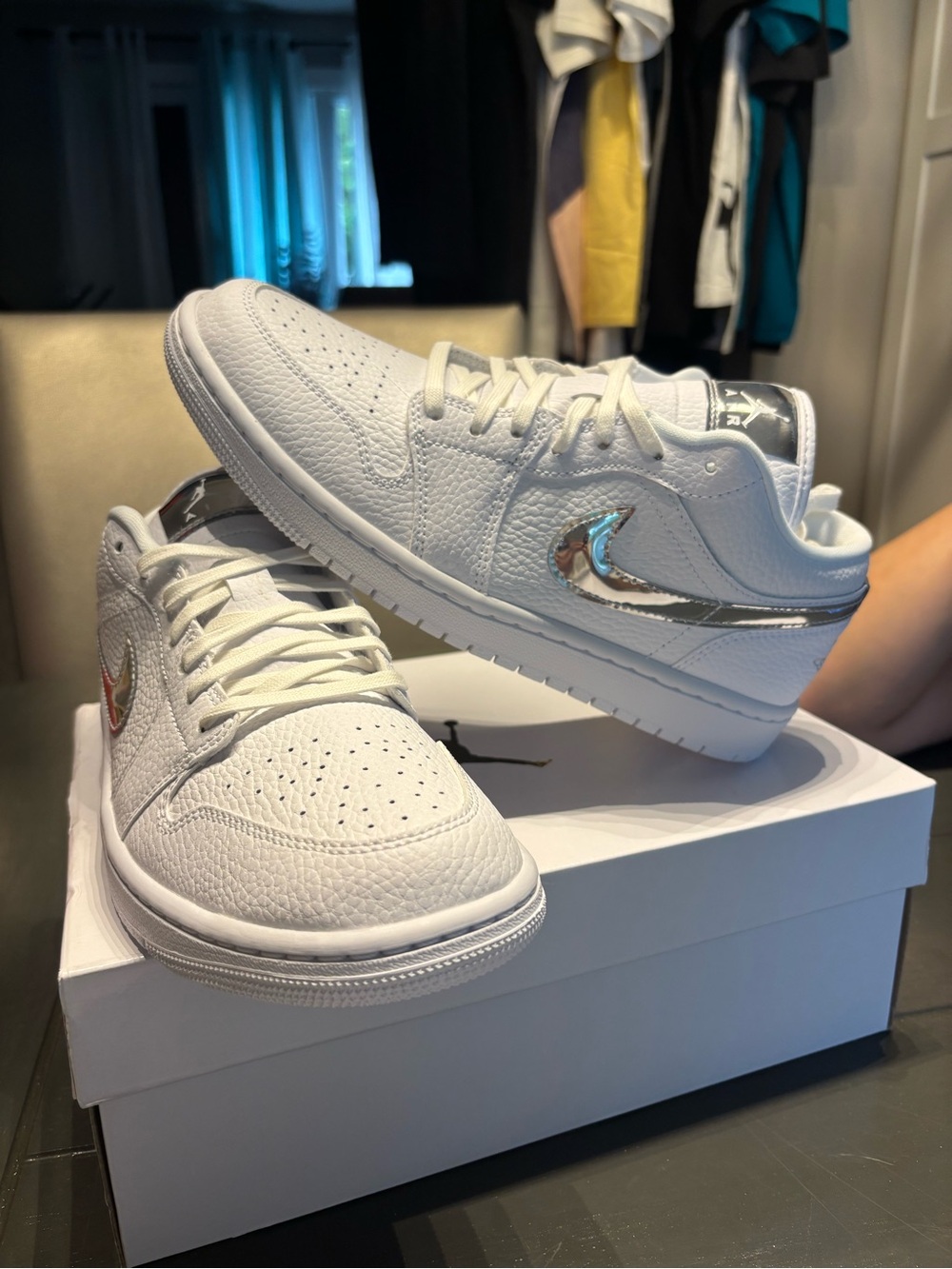 Nike Women’s White Low-Top Sneakers with Metallic Silver Swoosh